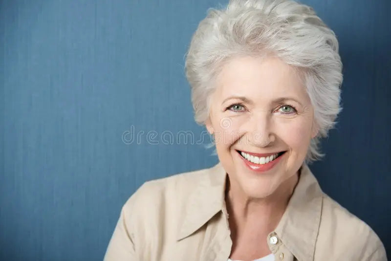files/beautiful-elderly-lady-lively-smile-elegant-looking-directly-camera-posing-against-green-background-33341544.webp